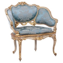 Antique Marquise in gilded and carved wood in the LXV style. Circa 1880.