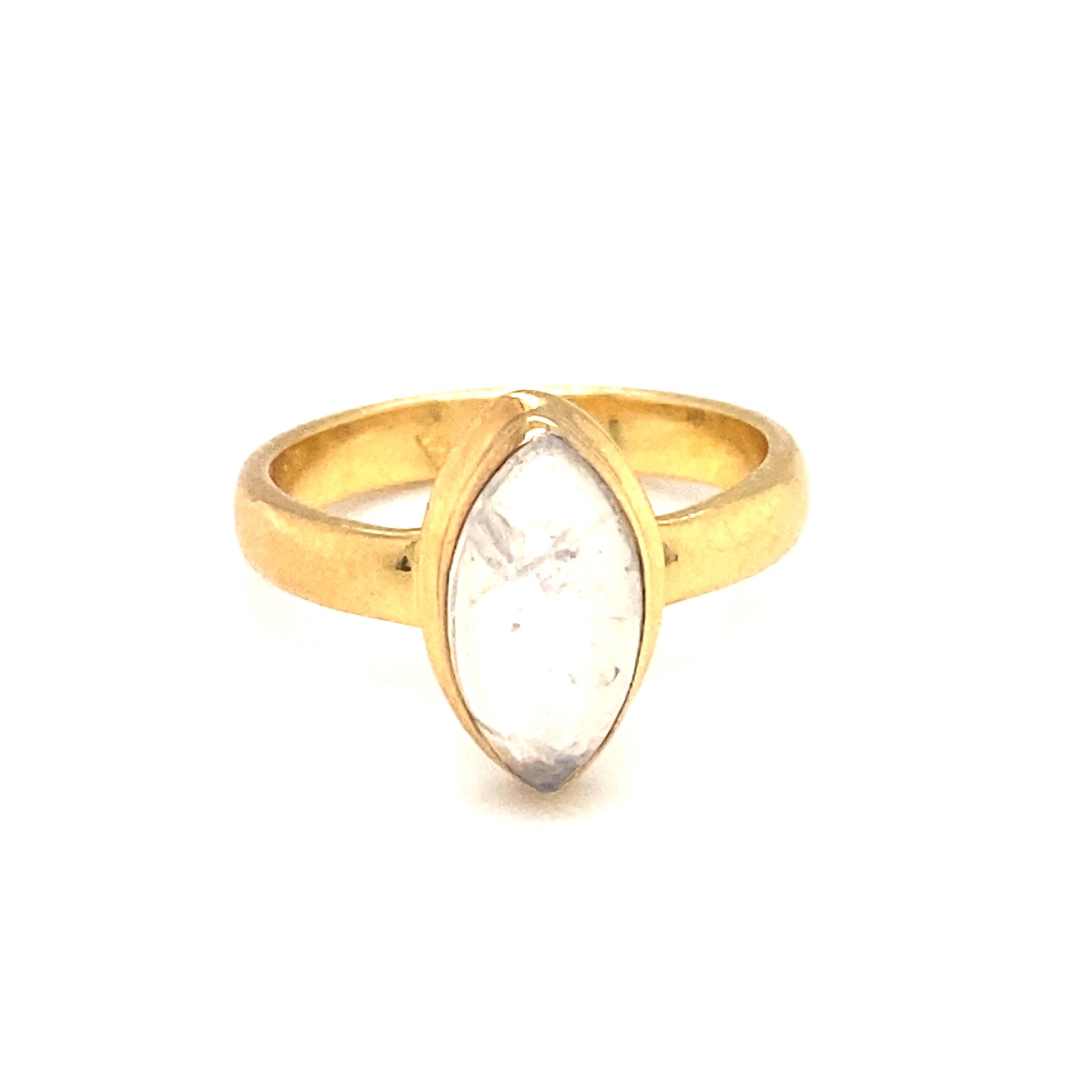 
Item Details: This dainty ring has a center marquise cabochon labradorite in a gold plated sterling setting.

Circa: 21st Century
Metal Type: Gold plated sterling silver
Weight: 3.2g
Size: US 6
