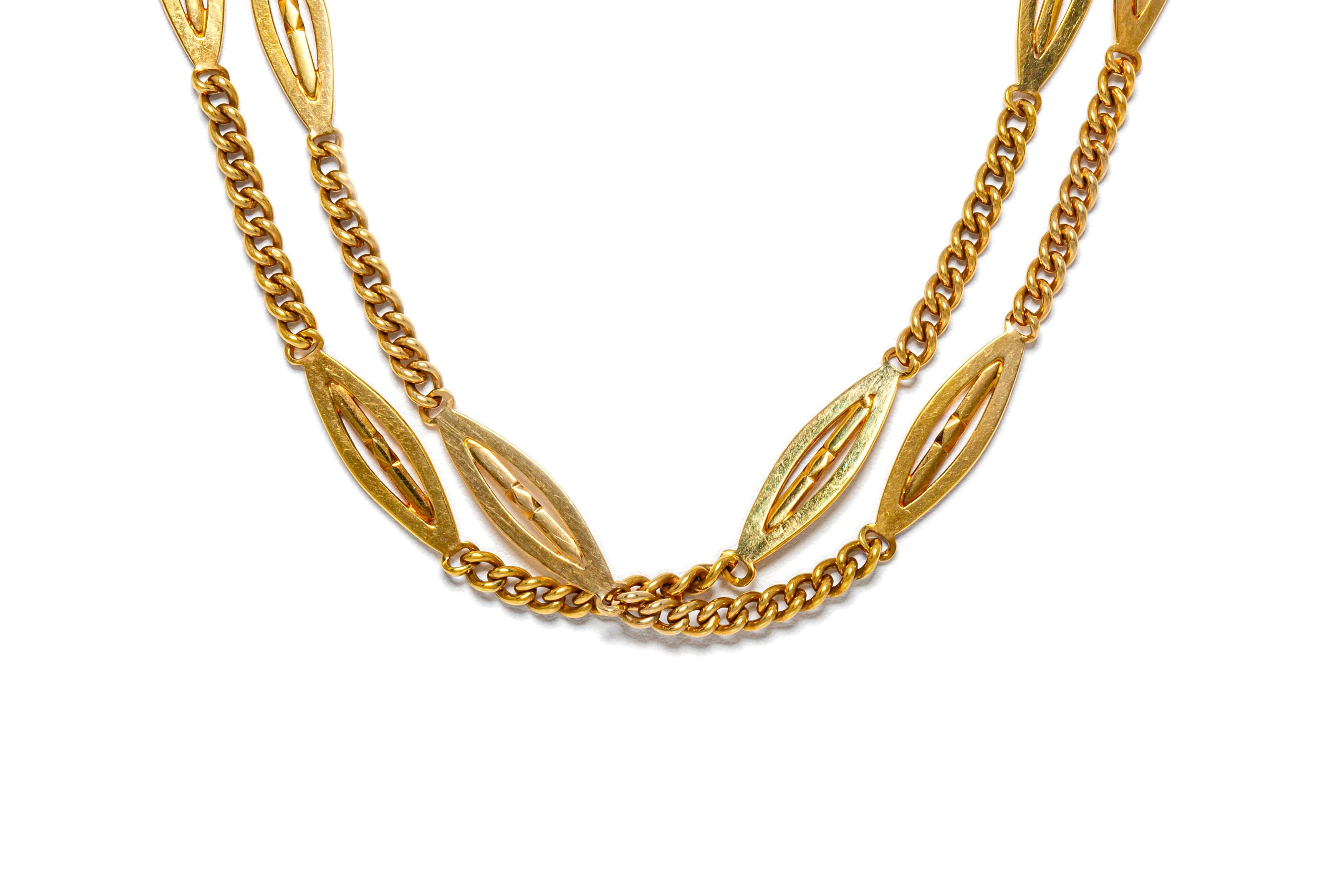 Chain, finely crafted in 14k yellow gold weighing 87.7 grams/56.4 dwt. The length of the chain is 74 inch/ 186 cm. Circa 1910's.