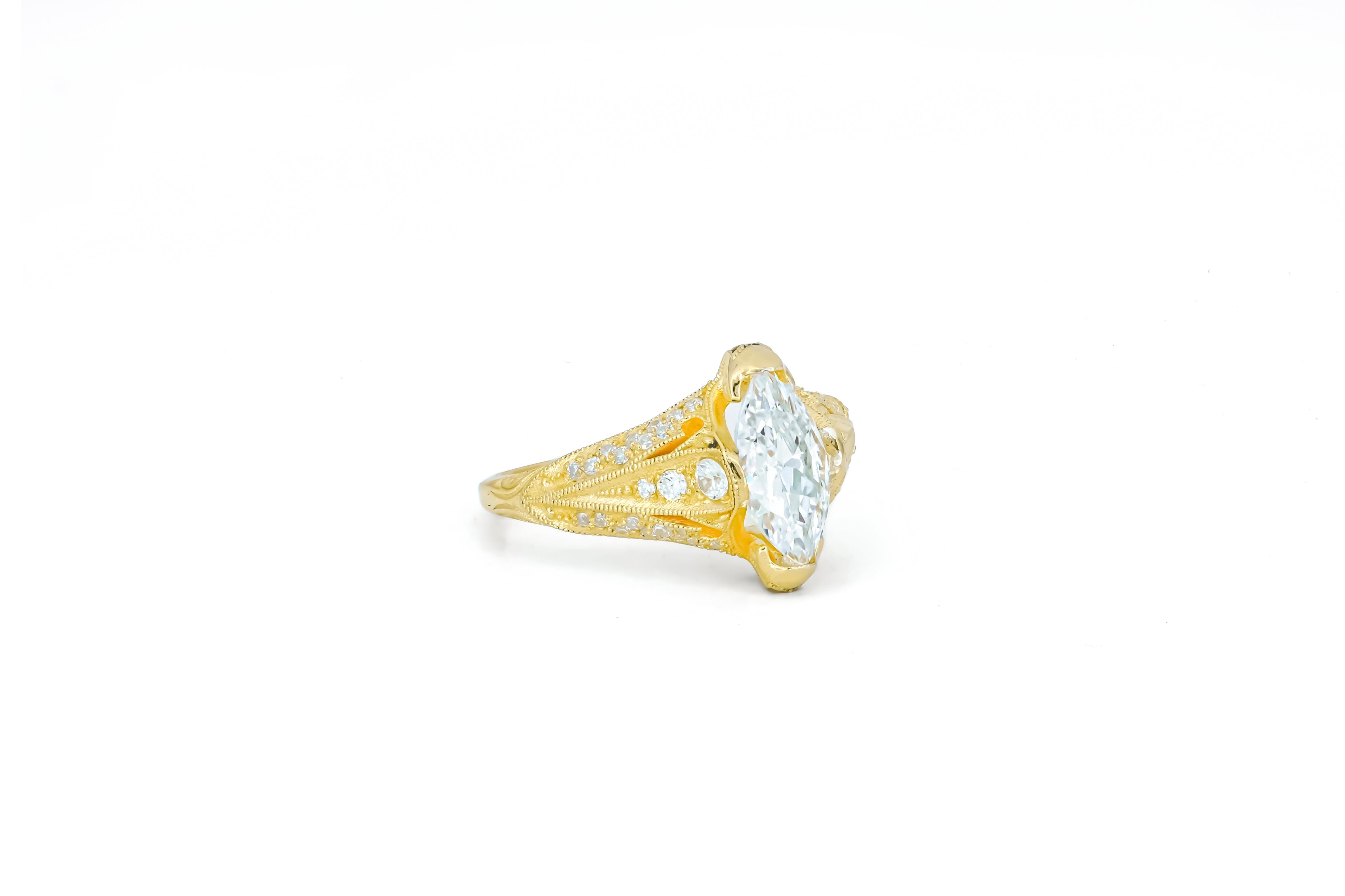Modern Marquise moissanite 14k gold engagement ring. For Sale