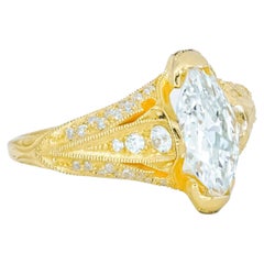 Marquise moissanite 14k gold engagement ring.