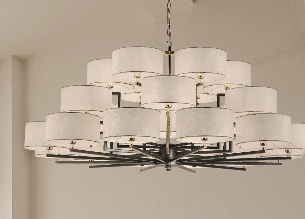 Lampada a sospensione Marquise Orion 24 di MM Lampadari
Dimensioni: Ø 180 x H. 80 cm. 
Materiali: Fabrice e metallo.

Tutte le nostre lampade possono essere cablate a seconda del Paese. Se viene venduto negli Stati Uniti, sarà cablato per gli Stati