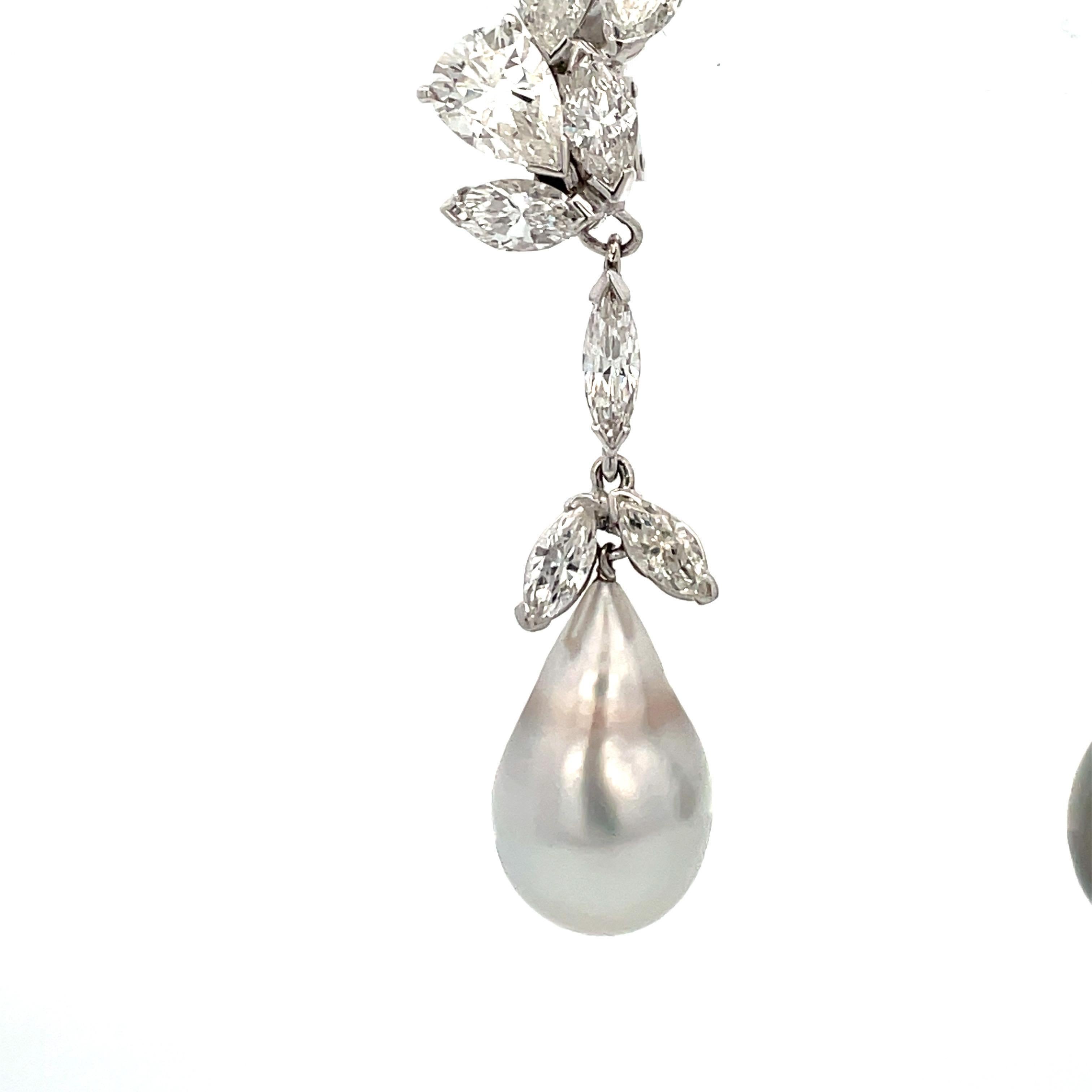 CIRCA 1950's, diese Vintage-Ohrringe verfügen über eine Gruppe von Marquise & Pear Cut Diamanten mit einem Gewicht von ca. 7,50 Karat mit zwei Barock Perlen. 
Perlen messen 
Länge 19-20 MM 
Breite 11-12 MM 