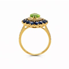 Marquise Peridot, Diamond and Sapphire Cluster Ring in 14 Karat Gold