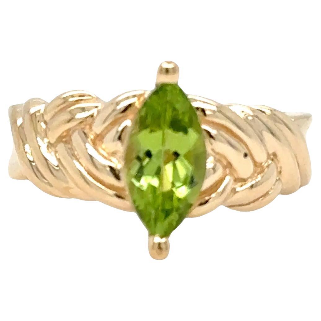 Marquise Peridot Rope Design Ring – North-South Prong Set in 14k Yellow Gold For Sale