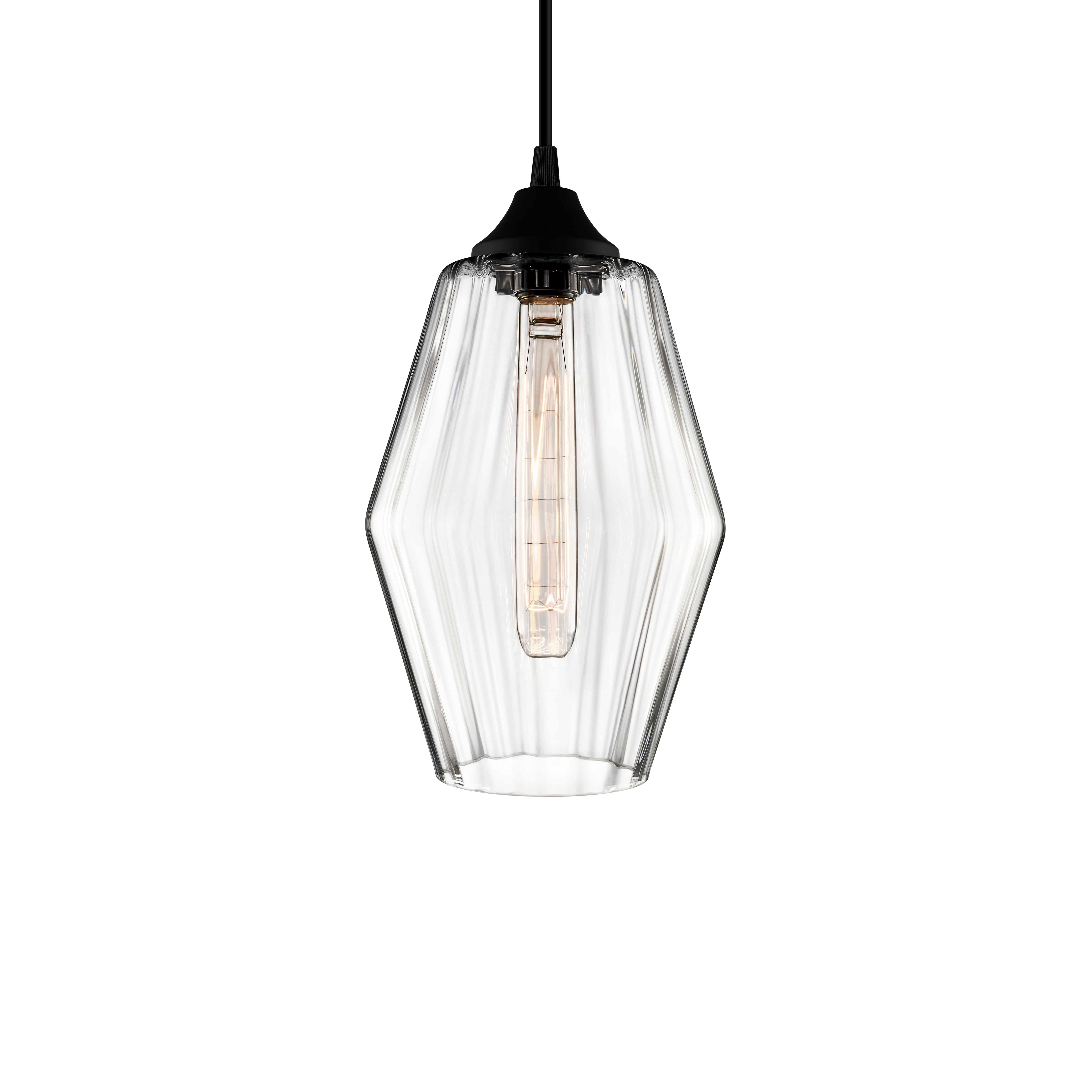 Available in three sizes, this versatile series is comprised of Niche's newest shape, the Marquise. Pendants can be clustered in multiples to create stunning visual arrangements and to showcase the dynamic partnership or individually hung in any