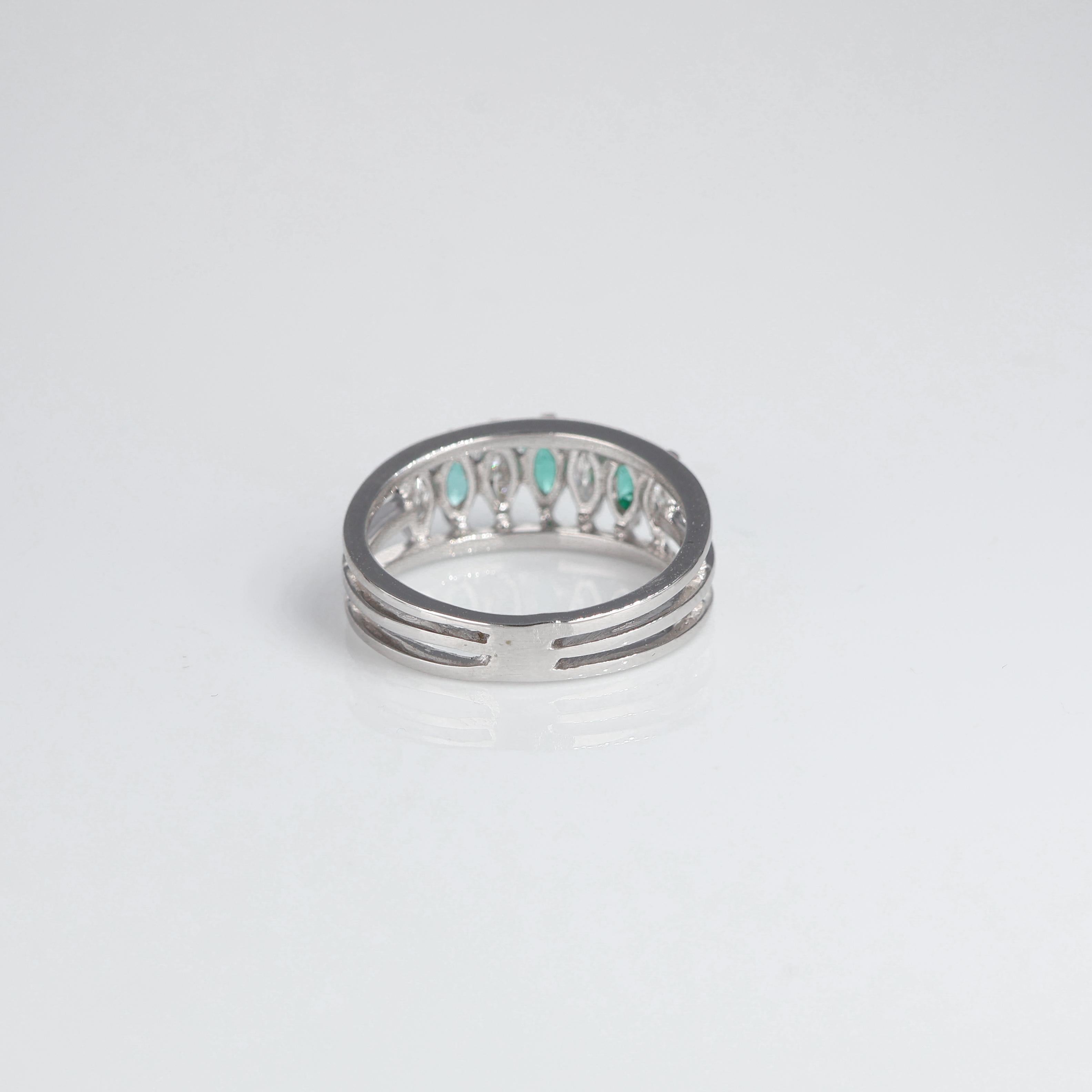 Women's or Men's Marquise Ring White Gold Emerald 0.36 carats and White Diamond 0.55 carats For Sale