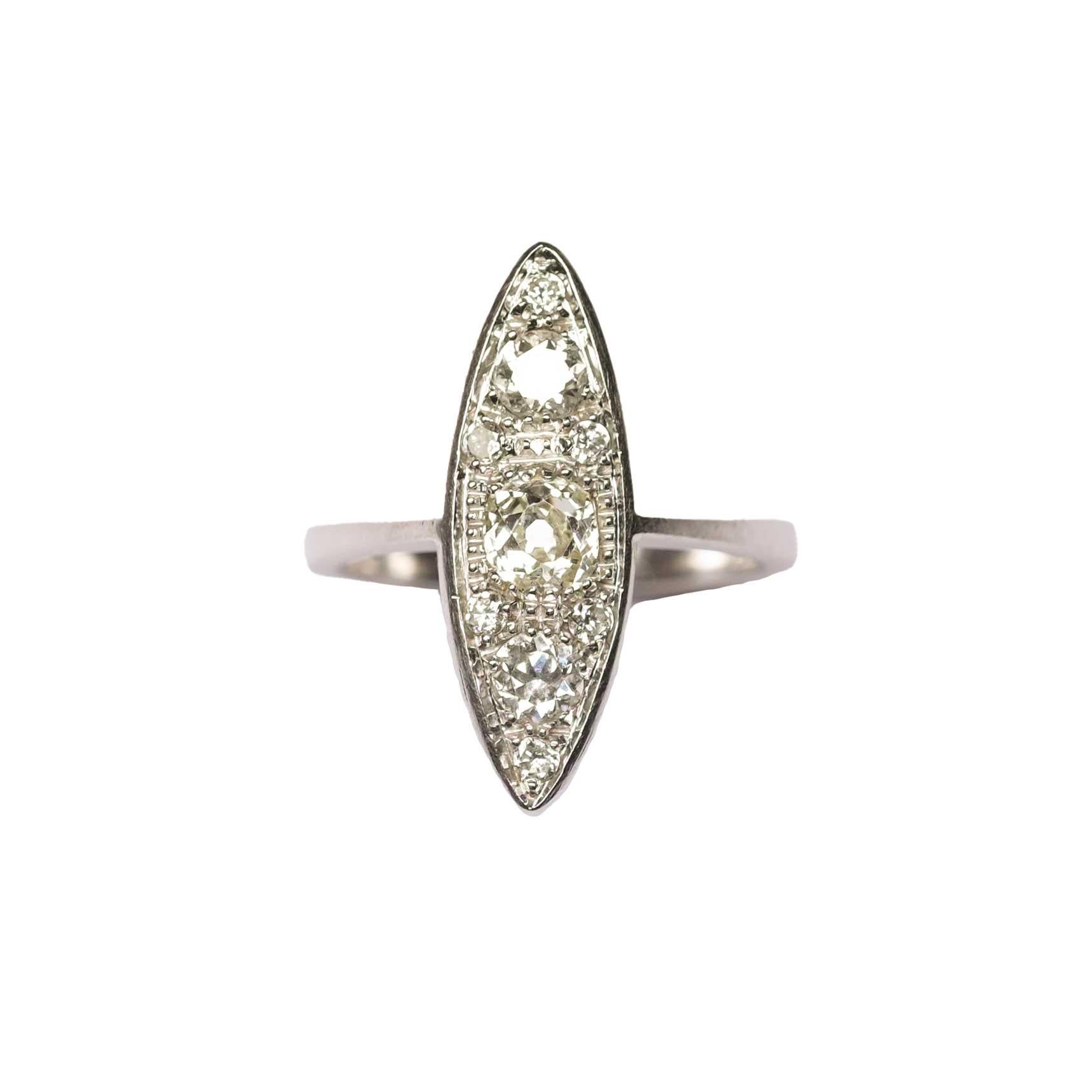 Vintage ring, made in Italy set in 18ct white gold with old cut diamonds for circa 0.75ct in total.
Central stone is a cushion cut diamond of circa 0.30ct, with a slight yellow tinge, with no visible inclusions to the eye.

Highlights
- Vintage Made