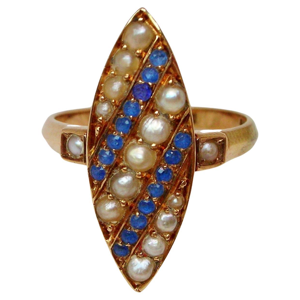 Bague en or rose marquise, perles et saphirs