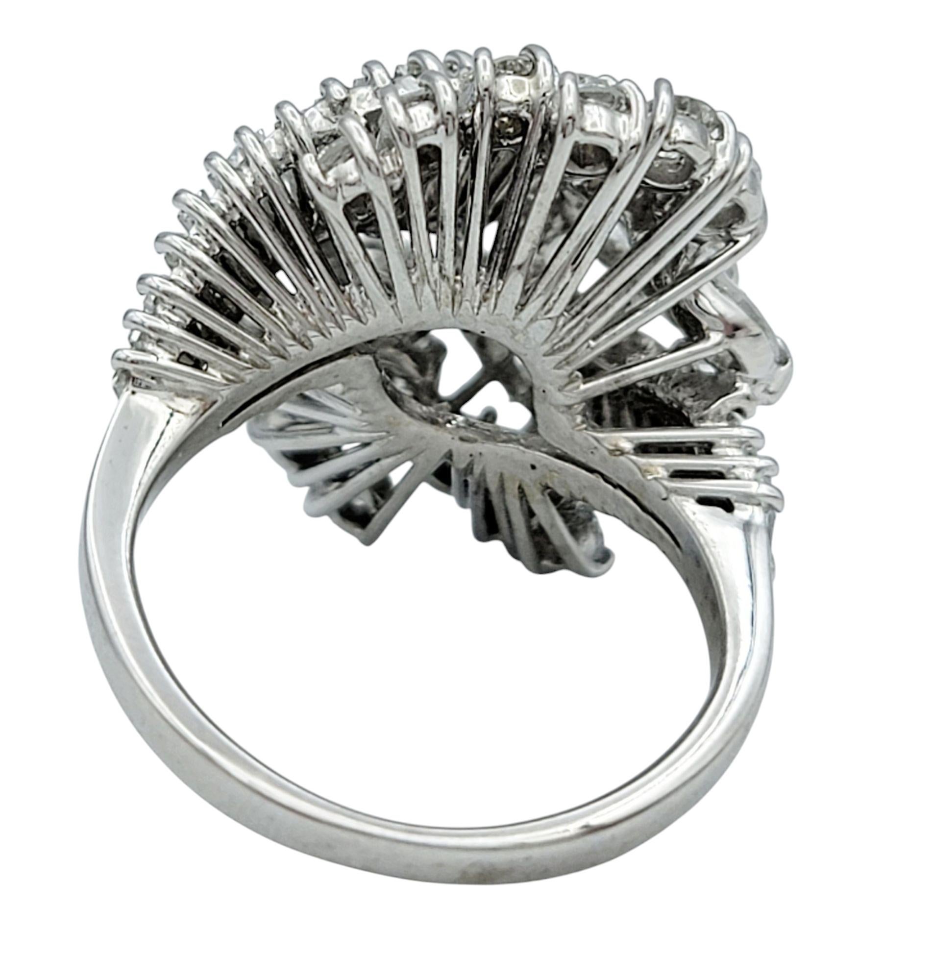 Women's Marquise, Round and Baguette Diamond Cluster Swirl Cocktail Ring 18 Karat Gold For Sale