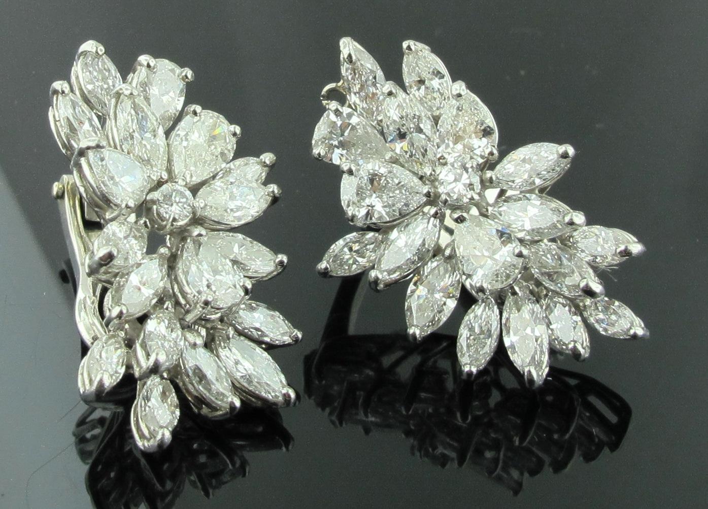 Set in Platinum each earring has 14 Marquise diamonds, weighing 4.0 carats, 4 Pear shaped diamonds, weighing 3.10 carats and one round brilliant weighing 015 carats.  Each earring is 7.25 carats in diamond weight.  In total, there are 38 diamonds