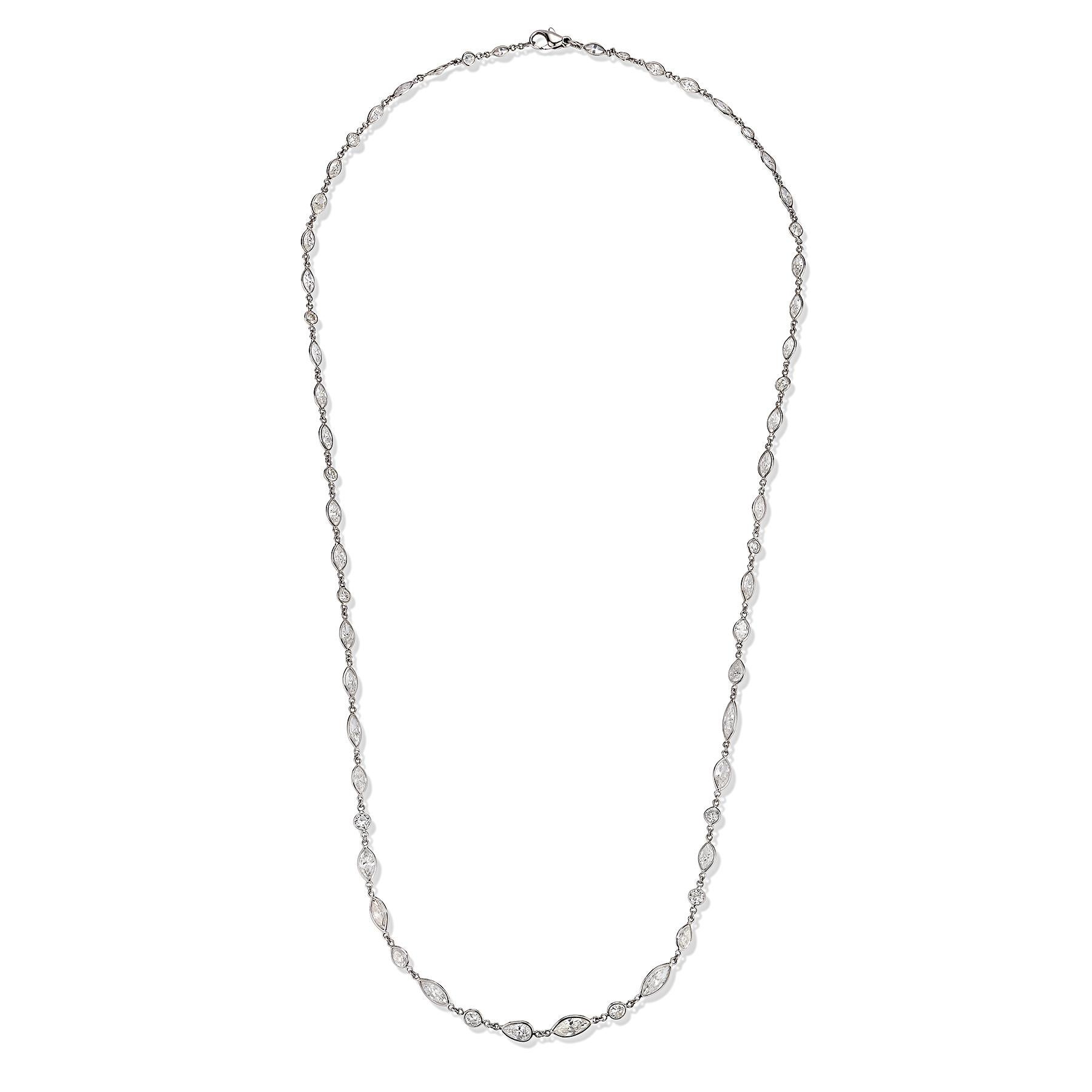 Marquise & Round Cut Diamond Long Chain Necklace

Marquise & round cut diamonds linked together forming a long necklace.

Total Diamond Weight: 22.60 cts 

Measurements: 27.5