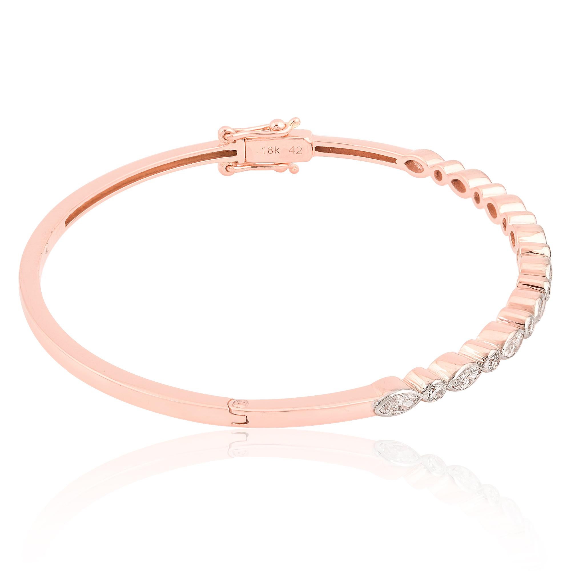 Each facet of this bangle bracelet is a testament to the artisanal expertise and attention to detail that goes into its creation. Crafted by skilled hands, the lustrous 14 Karat Rose Gold setting forms a perfect backdrop for the dazzling array of