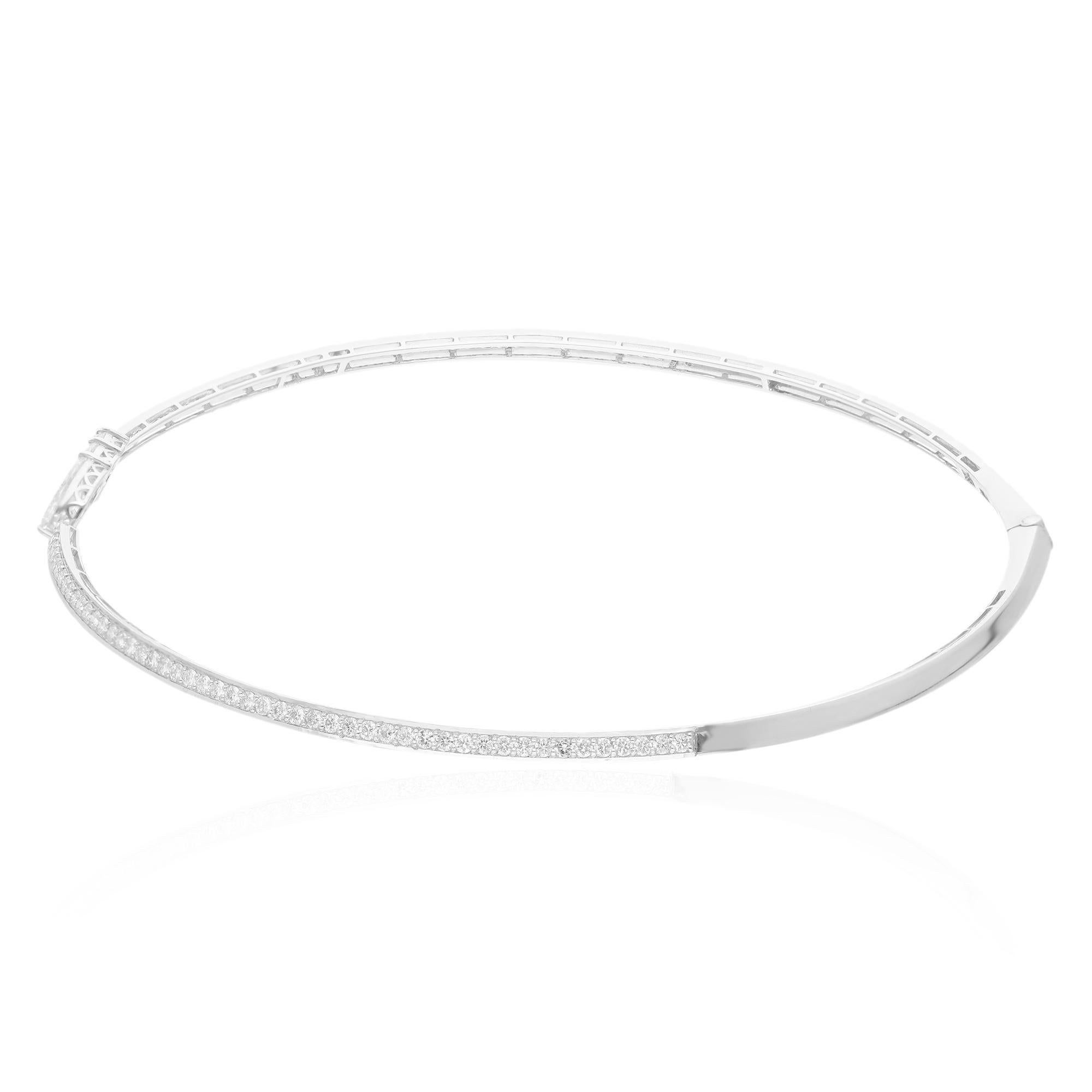 The 14 karat white gold setting provides a luxurious backdrop for the radiant diamonds, adding a touch of timeless elegance to the piece. The cuff design ensures a comfortable and secure fit, while the choker style accentuates the neckline with