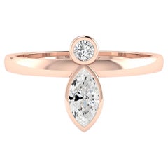 Marquise & Round Diamond Ring in 18 Karat Rose Gold