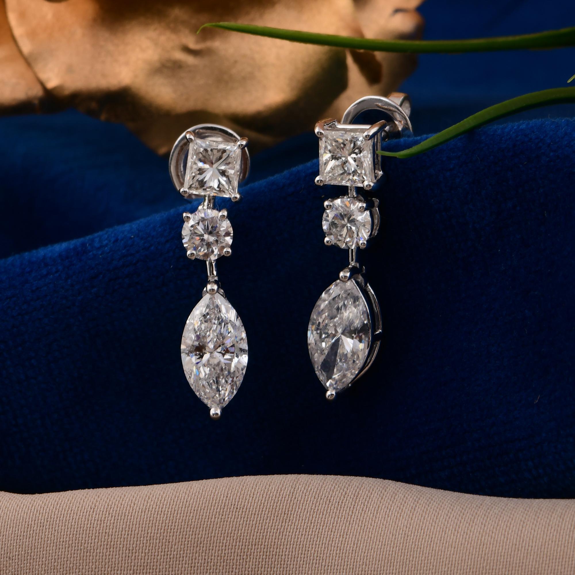 Moderne Boucles d'oreilles pendantes en or blanc 14 carats avec diamants ronds taillés en princesse. en vente
