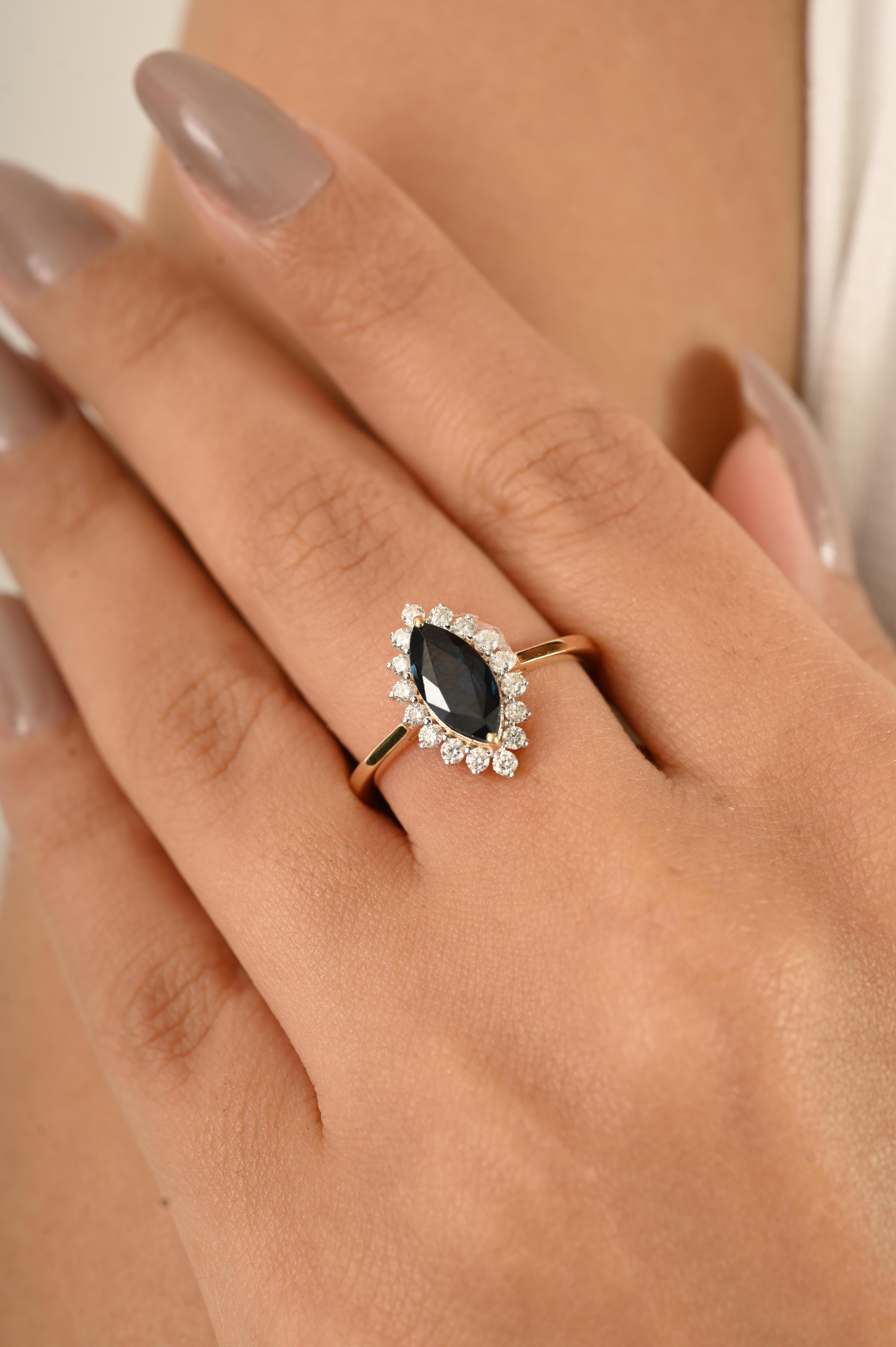 For Sale:  Marquise Royal Blue Sapphire & Halo Diamond Cluster Ring in 18kt Yellow Gold 10