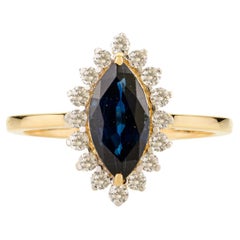Marquise Royal Blue Sapphire & Halo Diamond Cluster Ring in 18kt Yellow Gold
