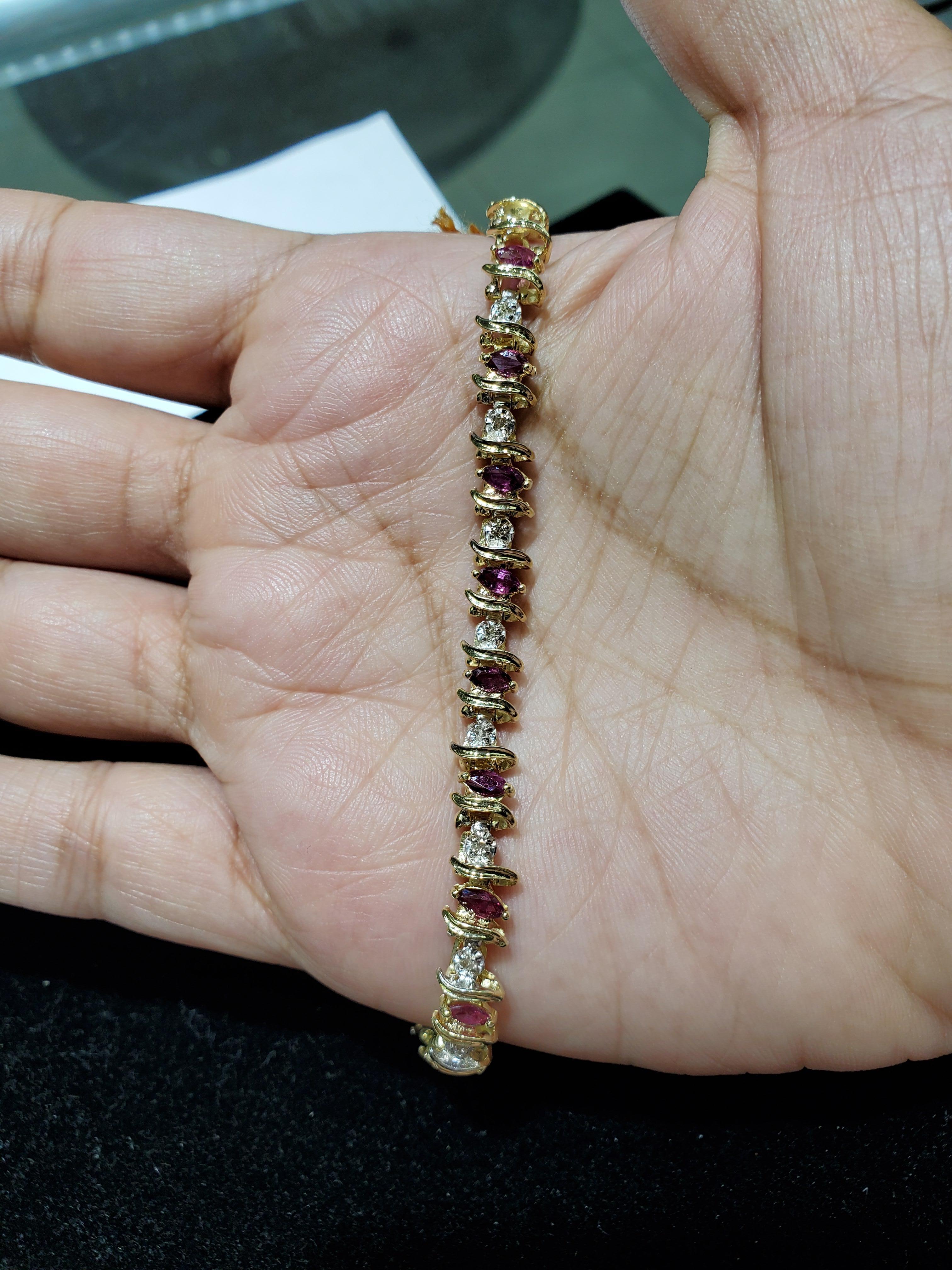 ♥ Tennis Bracelet Description ♥

Main Stone: Ruby & Diamonds
Approx. Carat Weight: 2.30cttw
Approx. Ruby Carat Weight: 2.00ct
Approx. Diamond Carat Weight: .30ct
Metal Type: 14K Yellow Gold
Stone Cut: Round/Marquise
Metal Weight: 12 grams
Bracelet