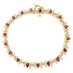 Tennisarmband aus Marquise-Rubin und Diamant