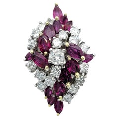 Marquise Ruby 
Round Diamond Clustered Cocktail Ring in 14 Karat Gold