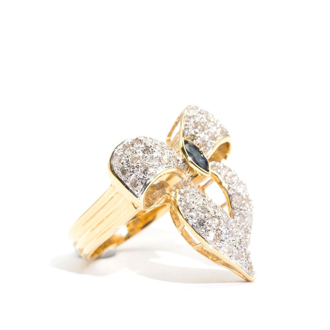 Modern Marquise Sapphire and 0.80 Carat Diamond 18 Carat Gold Vintage Bow Cluster Ring