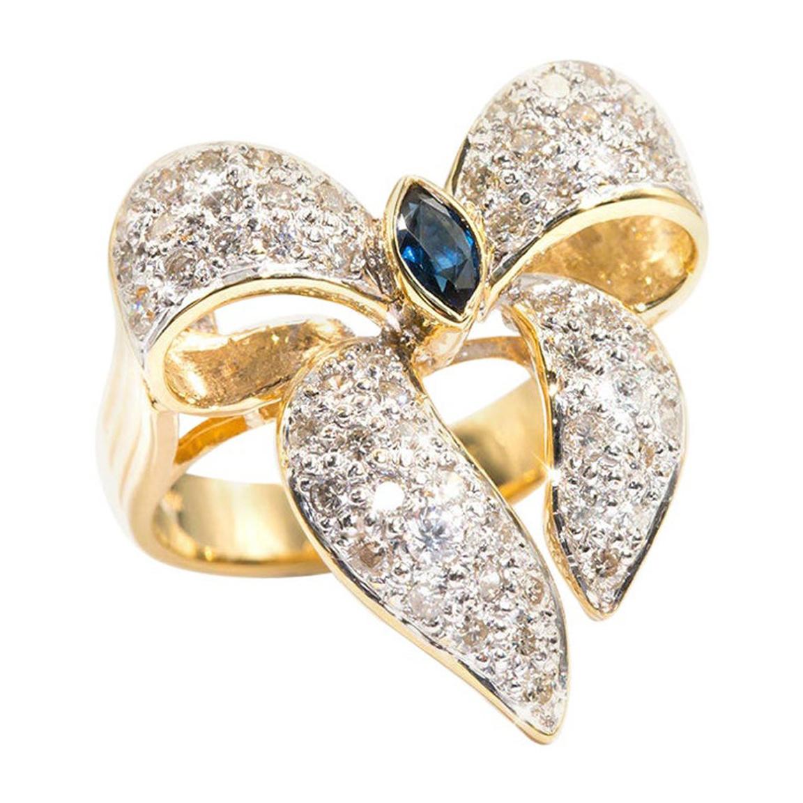 Marquise Sapphire and 0.80 Carat Diamond 18 Carat Gold Vintage Bow Cluster Ring