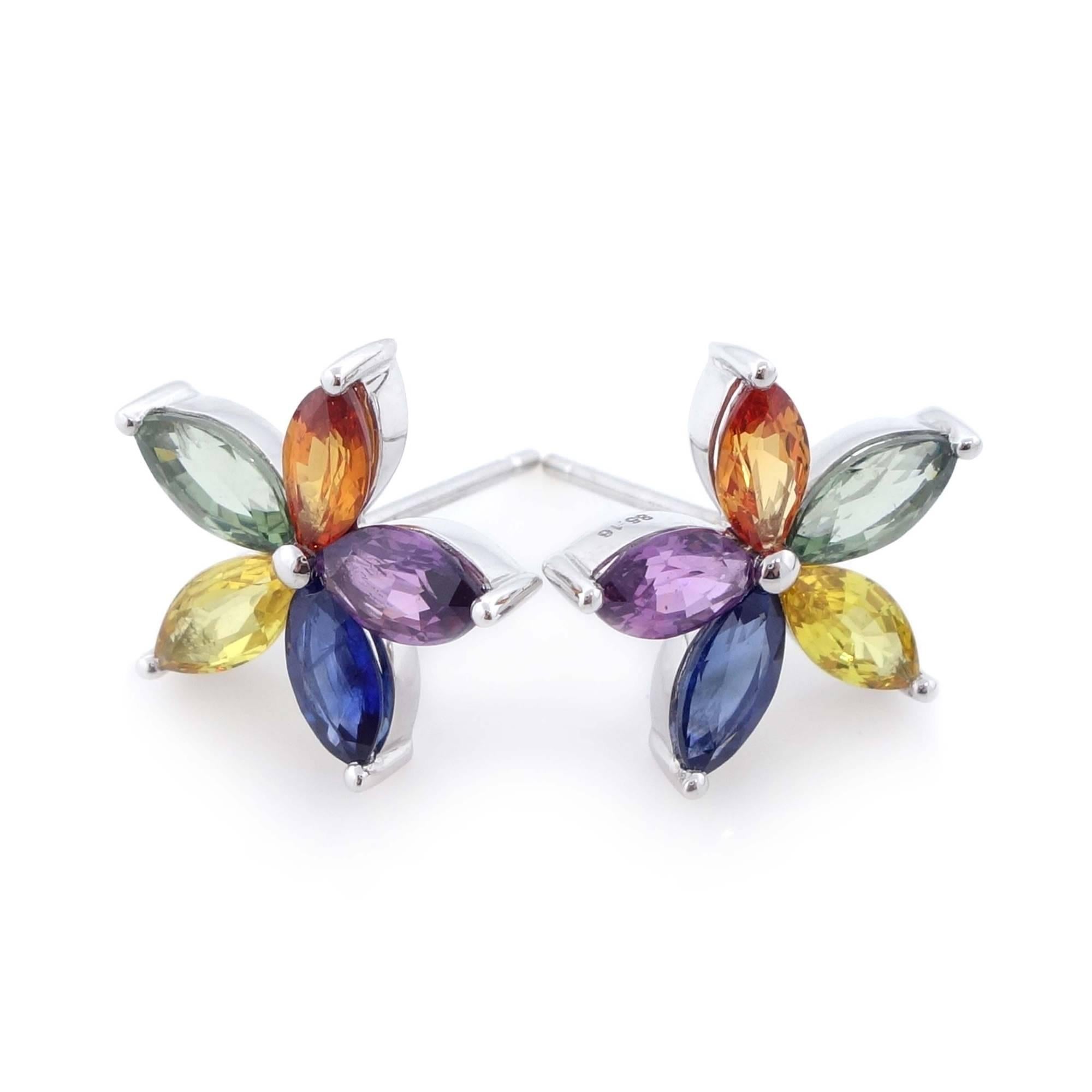 10 fine colorful marquise sapphires of about 5.16 carats. All sapphires are set in an 18k white gold earrings. 
Measurements: W 0.65 x H 0.65 inch
