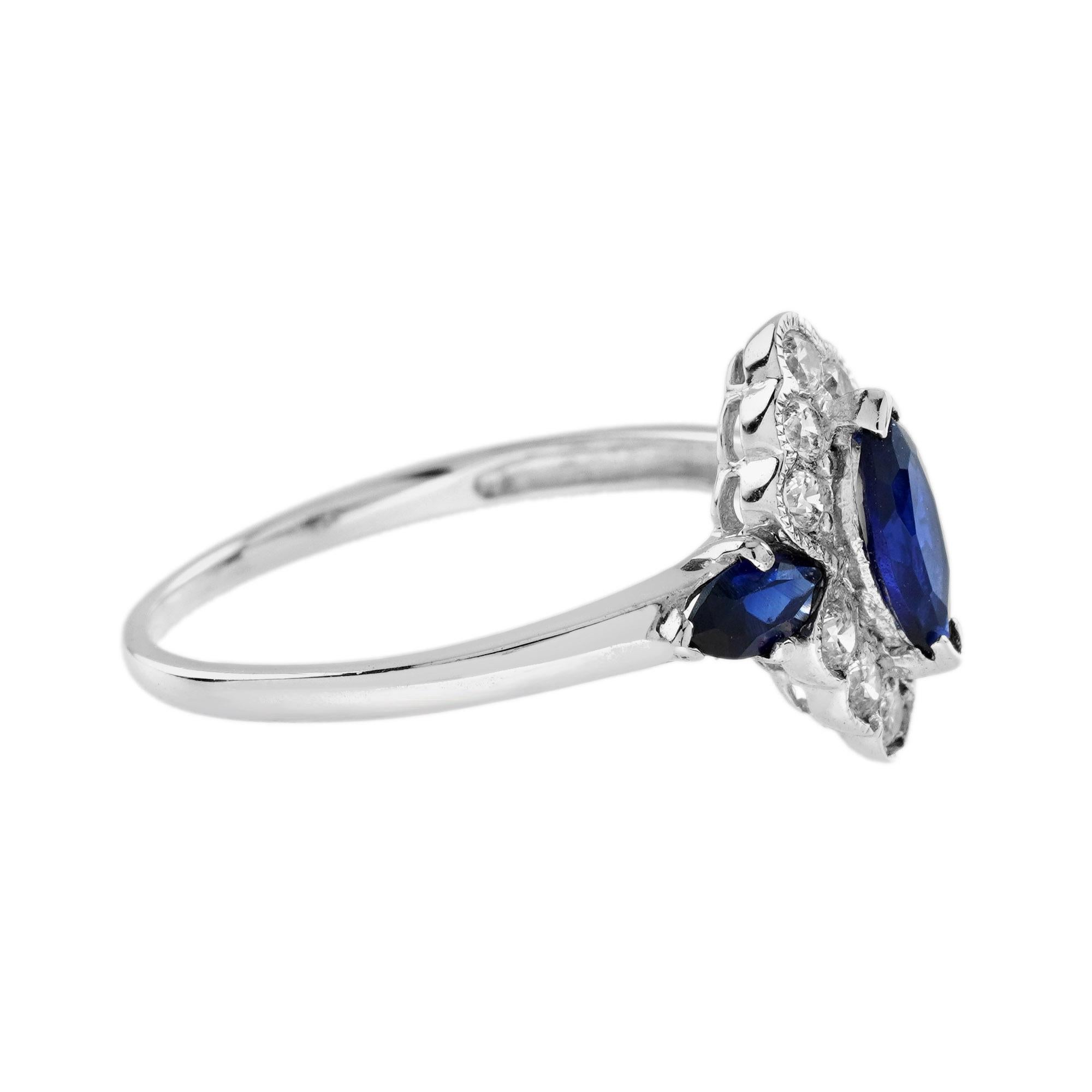 La simplicité du diamant et du saphir fonctionne très bien. Le diamant brillant entoure le saphir et forme une marquise. Des saphirs bleus supplémentaires sur ses épaules rendent la bague encore plus charmante. Or blanc 14K. 
Informations sur