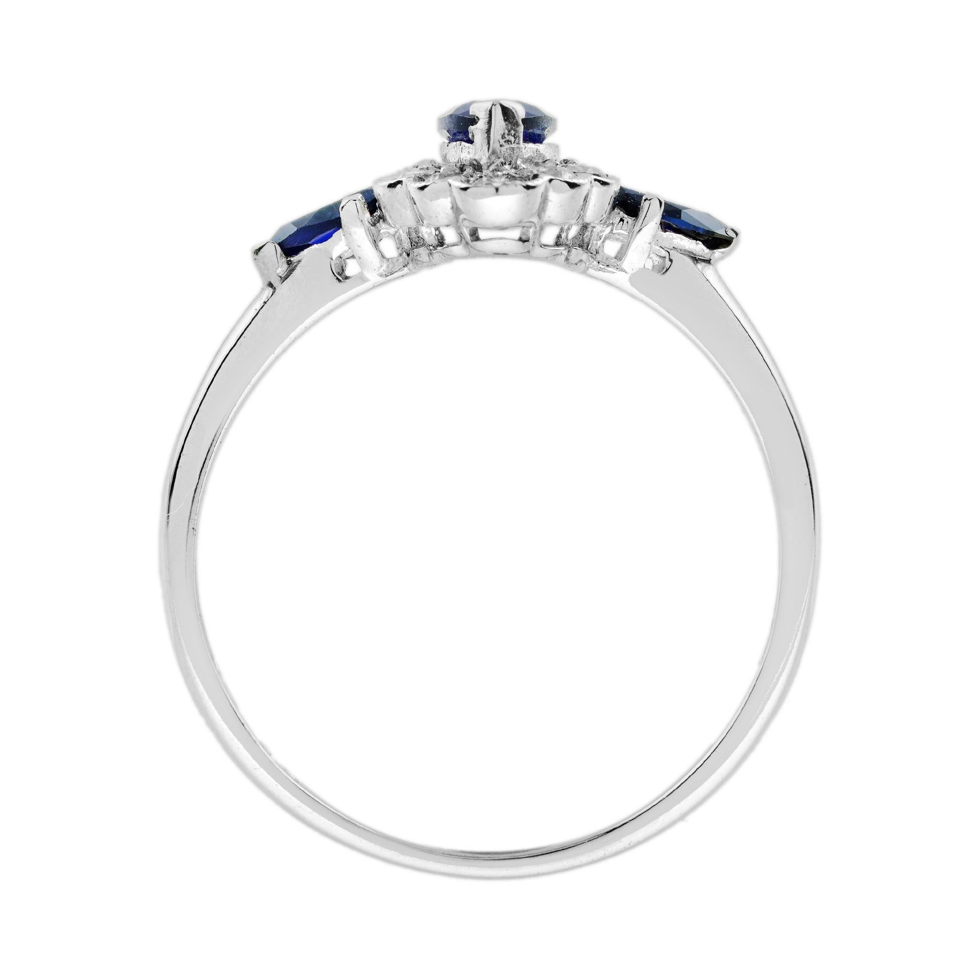 Art déco Bague en or blanc 14K sertie d'un halo de saphirs bleus et de diamants de forme marquise en vente