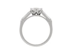 Marquise shape diamond flanked solitaire ring, circa 1950