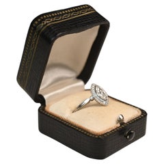 Marquise Shape Engagement Ring. 0.50ct Diamond Halo Ring Platinum Bezel Setting