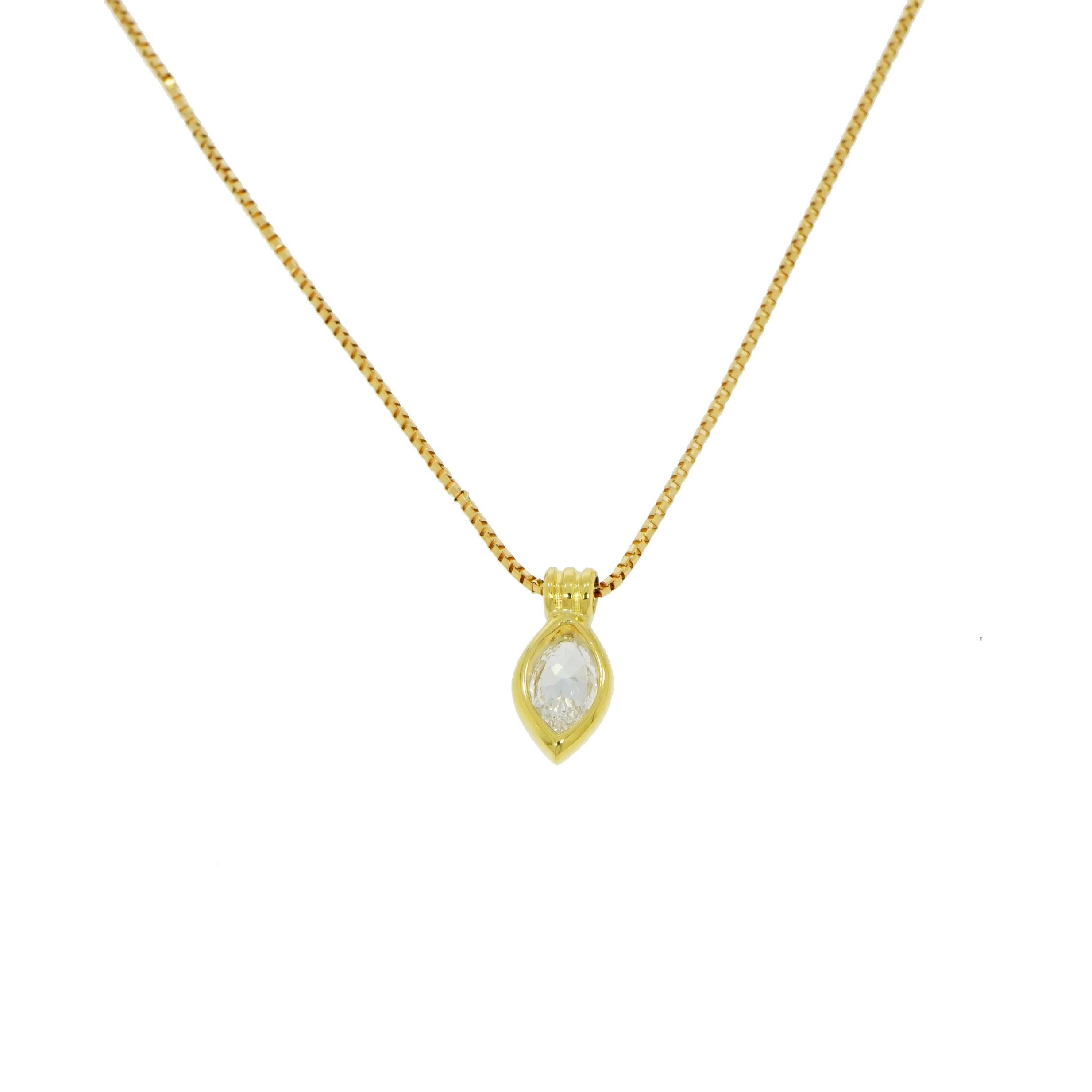 This classic Solitaire Marquise shaped Diamond Pendant is to reminds us of the space in-between that holds a special meaning in our hearts. 
The solid bezel setting features a 1.00 carat marquise shaped diamond with an open back and fixed coiled