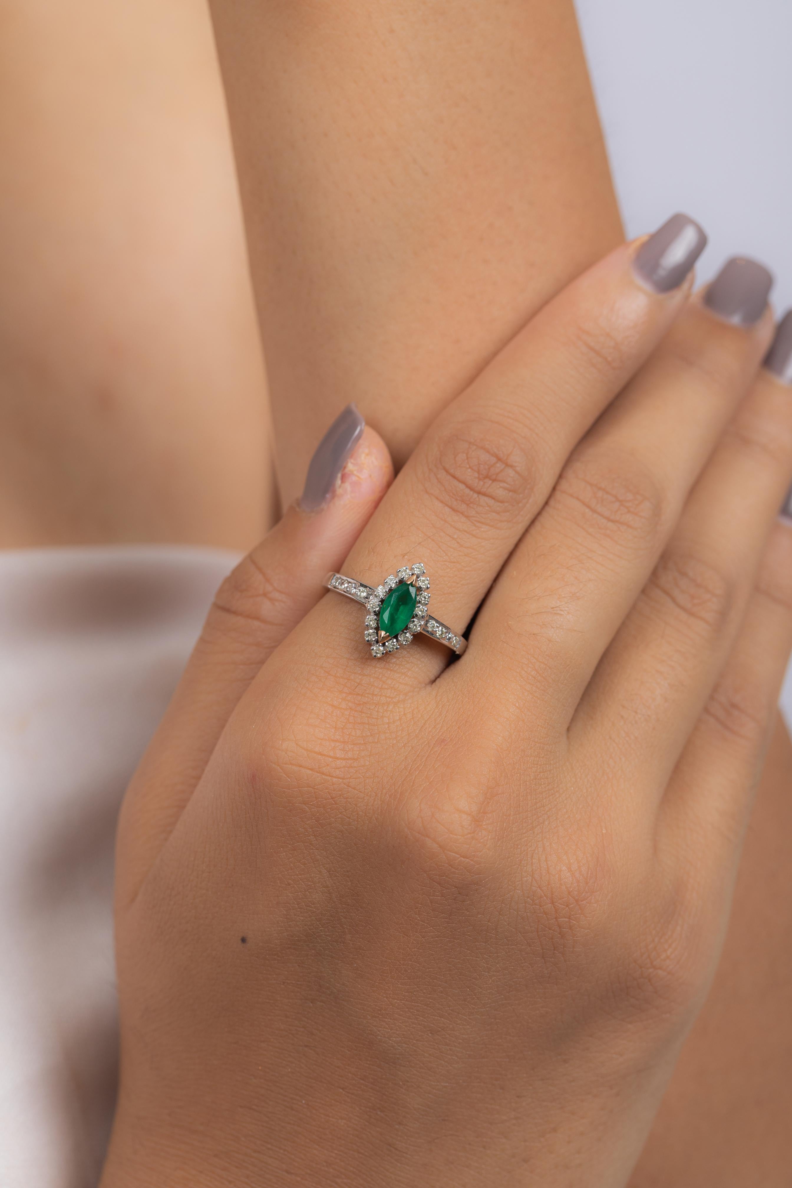 For Sale:  Marquise Shaped Emerald and Diamond Ring in 14K White Gold 7