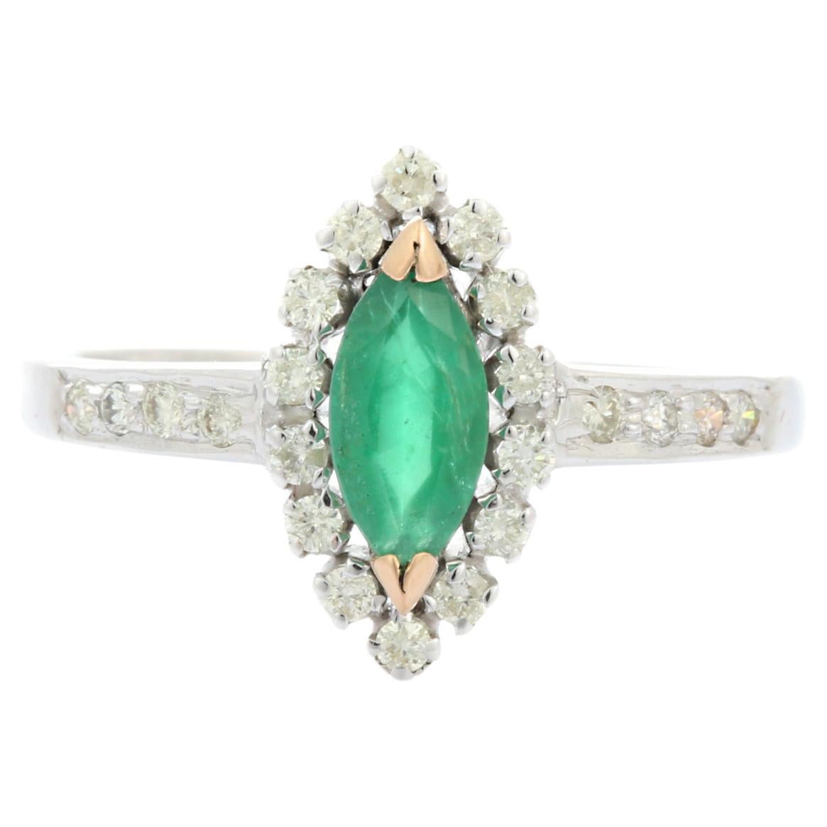 Marquise Shaped Emerald and Diamond Ring in 14K White Gold