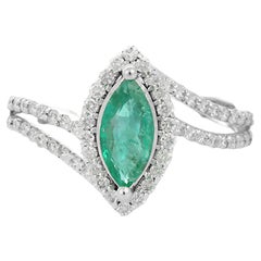 Marquise Shaped Emerald and Diamond Ring in 18K White Gold 