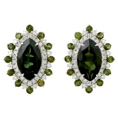 Borchie con tormalina verde a forma di marquise e diamanti in oro bianco 18 ct.