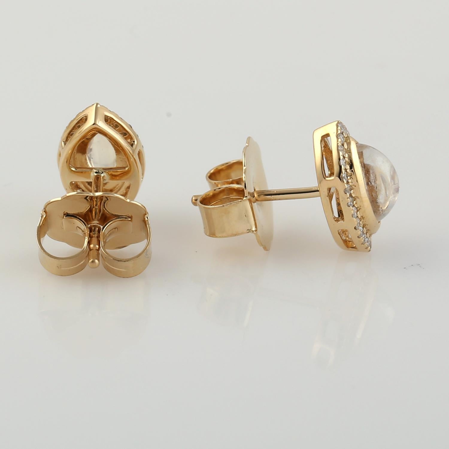 18KT: 2,841 g,
Diamante: 0,21ct, 
Pietra di luna: 0.95ct,