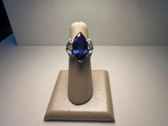 Marquise Tanzanite Ring with 8 carat center stone and Diamonds 18k white gold