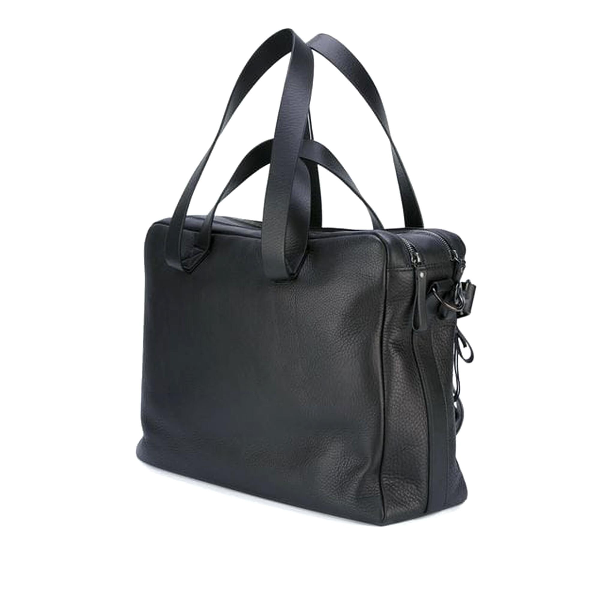 The Vittos Cano features a leather body, an exterior zip pocket, flat straps, a double top zip closures. It carries as AB condition rating.

Inclusions: 
This item does not come with inclusions.

Dimensions:
Length: 30.00 cm
Width: 43.00 cm
Depth: