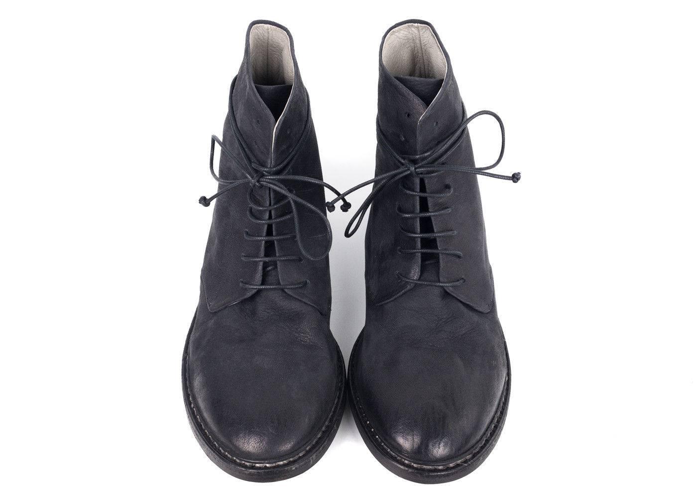 From the desire to create the highest quality and long wearing shoes for your everyday wear comes the Italian luxury brand Marsell. The Grupiatta boot in a lace-up combat boot style is crafted of supple full grain smokey black leather, accented by a