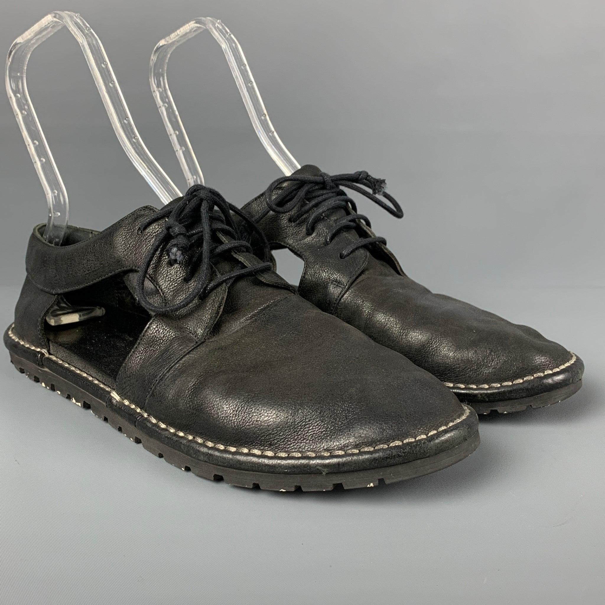 MARSELL shoes comes in a black leather featuring cutout designs, contrast stitching, and a lace up closure.
Good
Pre-Owned Condition. 

Marked:   43Outsole: 12.25 inches  x 4.5 inches 
  
  
 
Reference: 116647
Category: Lace Up Shoes
More Details
 
