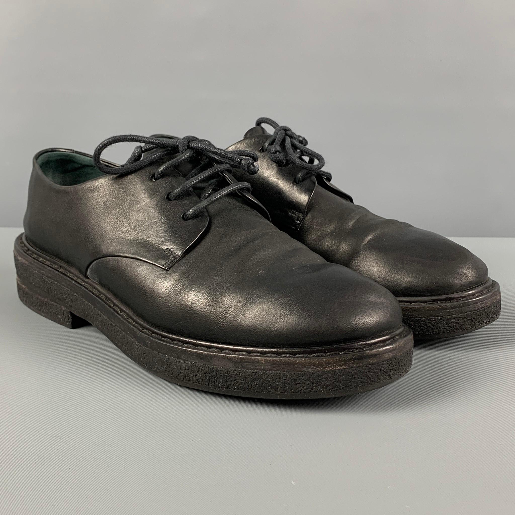 MARSELL shoes comes in a black leather featuring a round toe and a leather lace up closure. Includes box. Made in Italy. 

Very Good Pre-Owned Condition.
Marked: 36

Outsole: 10.5 in. x 4 in