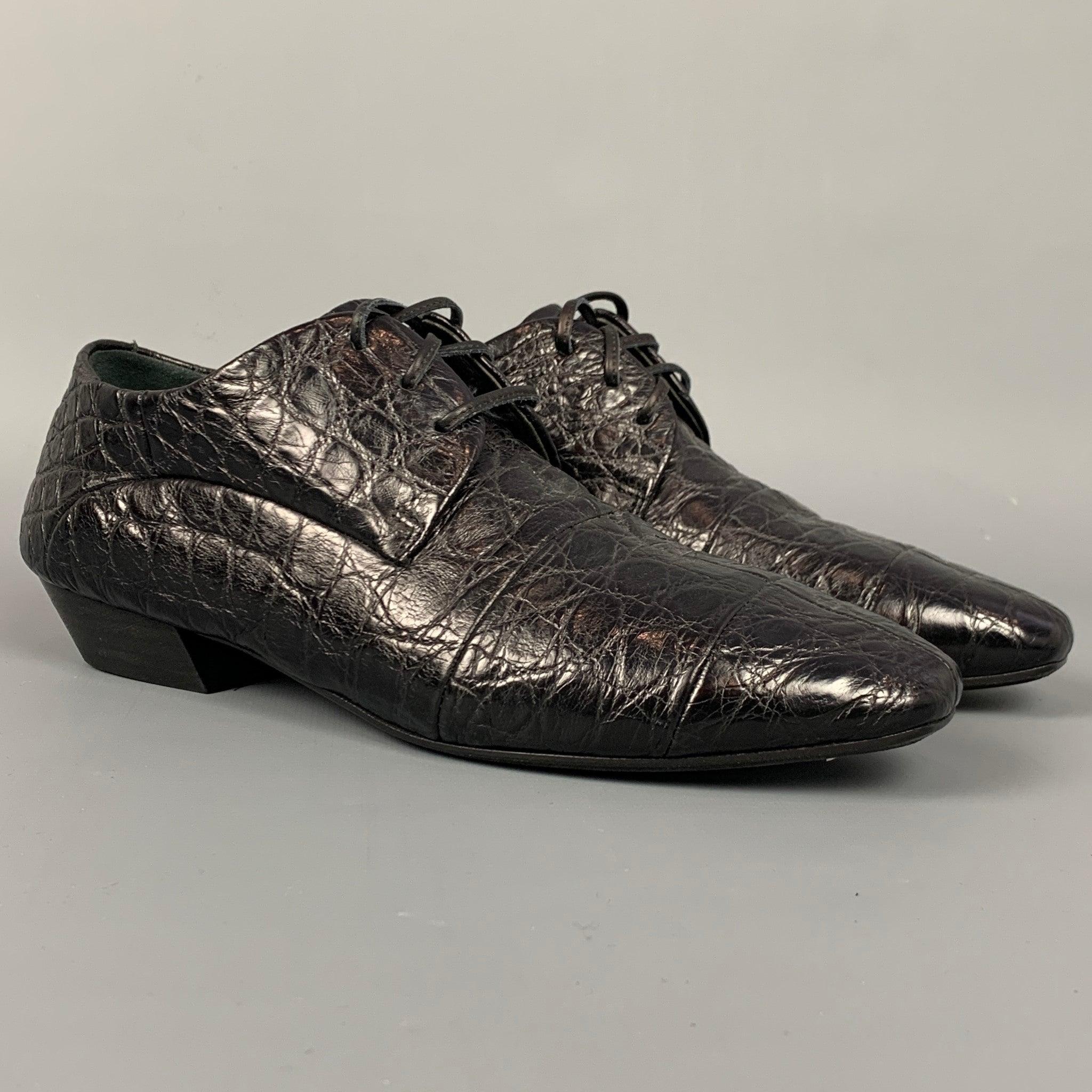 MARSELL flat laces comes in a black embossed leather featuring a square toe, wooden sole, and a lace up closure. Made in Italy.
Very Good
Pre-Owned Condition. 

Marked:   EU 37Outsole: 3 inches  x 9 inches 
  
  
 
Reference: 109157
Category: