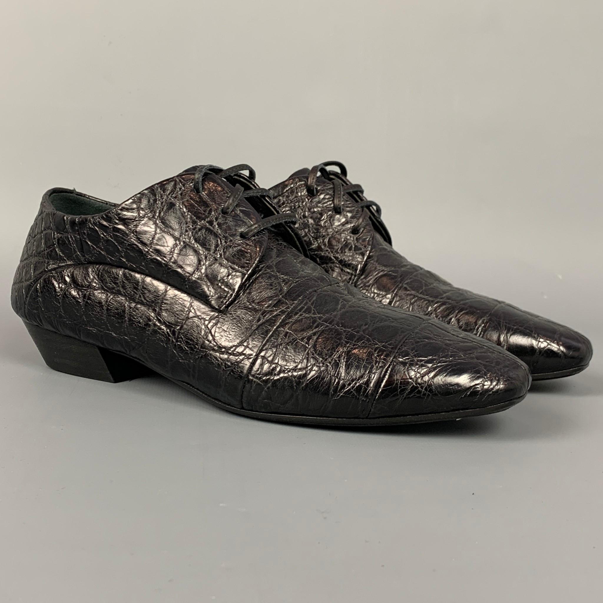 MARSELL flat laces comes in a black embossed leather featuring a square toe, wooden sole, and a lace up closure. Made in Italy. 

Very Good Pre-Owned Condition.
Marked: 37

Outsole: 3 in. x 9 in. 