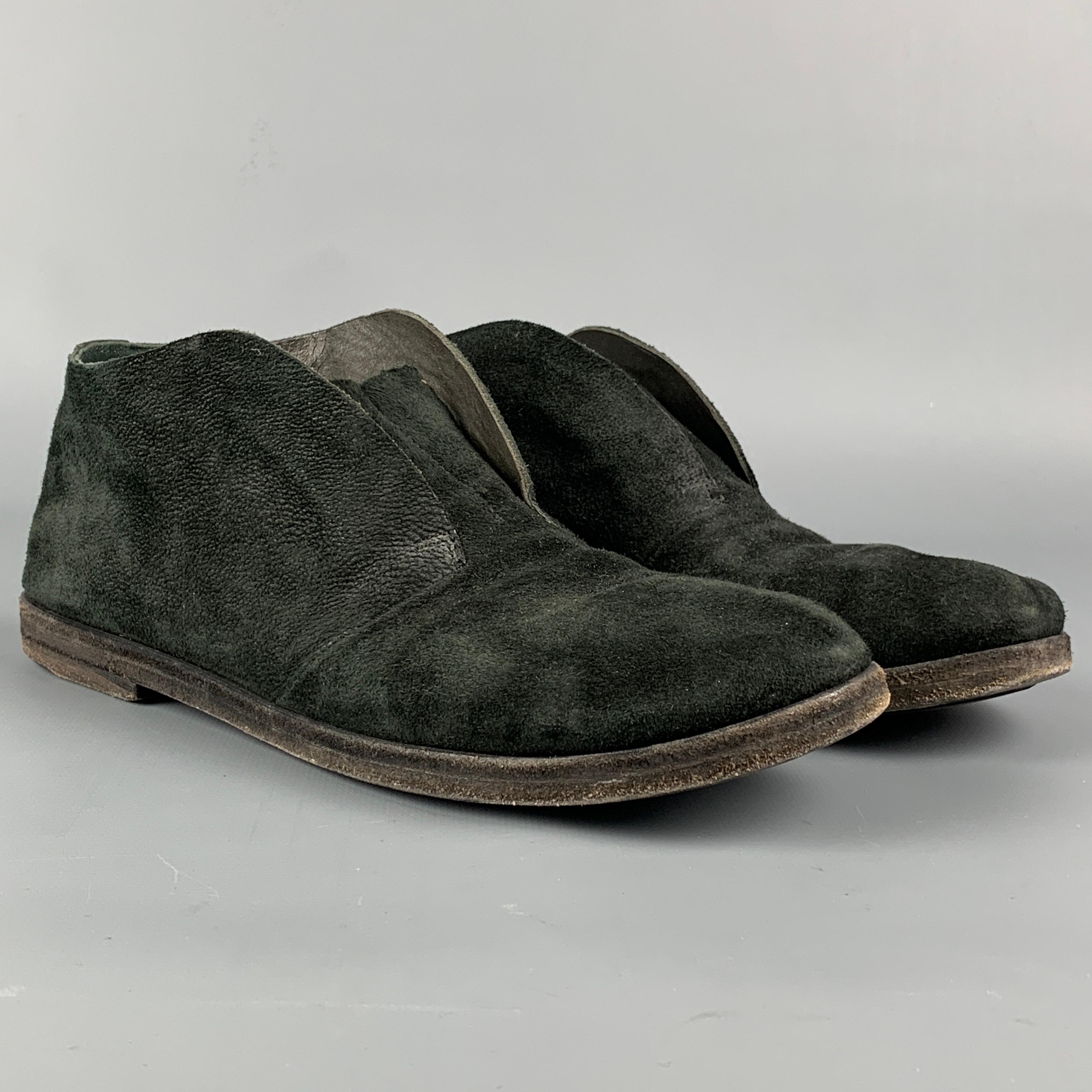 MARSELL flats comes in a black distressed suede featuring a slip on style and a round toe. Made in Italy.

Good Pre-Owned Condition.
Marked: 37

Outsole: 10.5 in. x 3.5 in. 

 