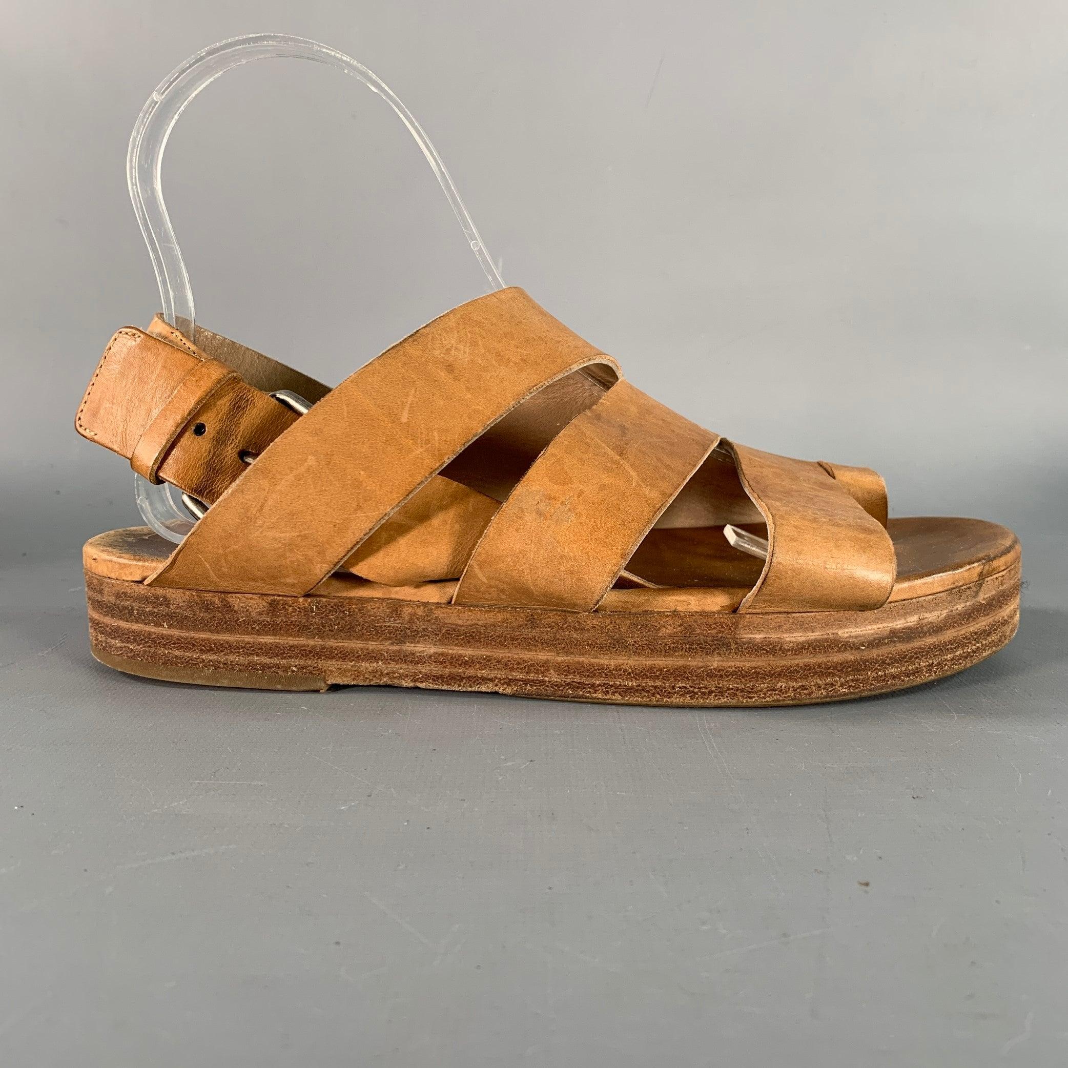 MARSELL sandals in a brown leather featuring a strappy design, and
silver tone buckle closure. Made in Italy.Very Good Pre-Owned Condition. 

Marked:   7.5Outsole:09.25 inches  x 3.75inches  

  
  
 
Sui Generis Reference: 139630
Category: