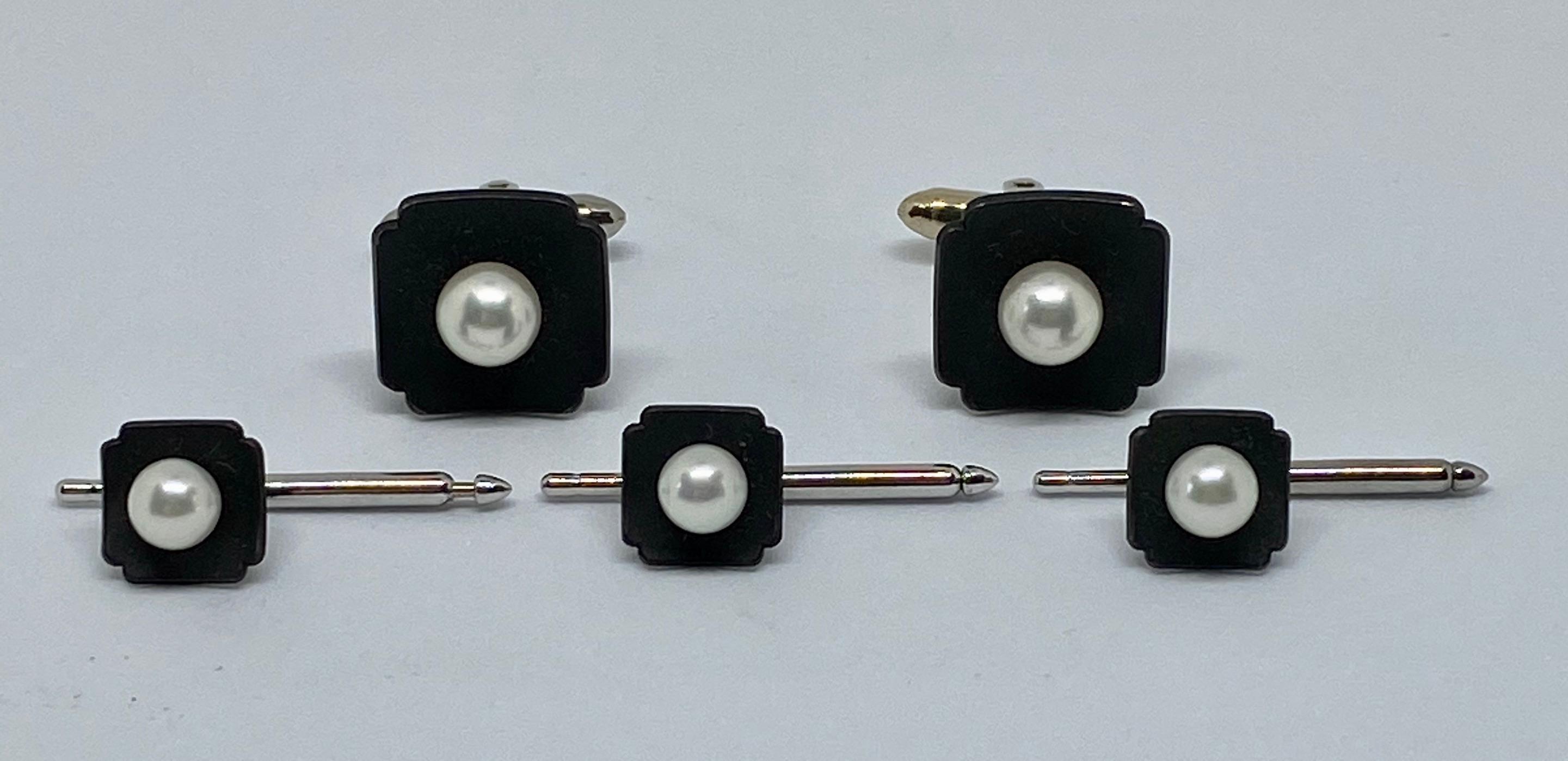Beautiful, original and highly collectible G.T. Marsh & Company dress set comprised of cufflinks and three matching shirt studs in oxidized steel with round, white cultured pearls and 14K white gold fittings. 

In the 19th Century, G.T. Marsh, an