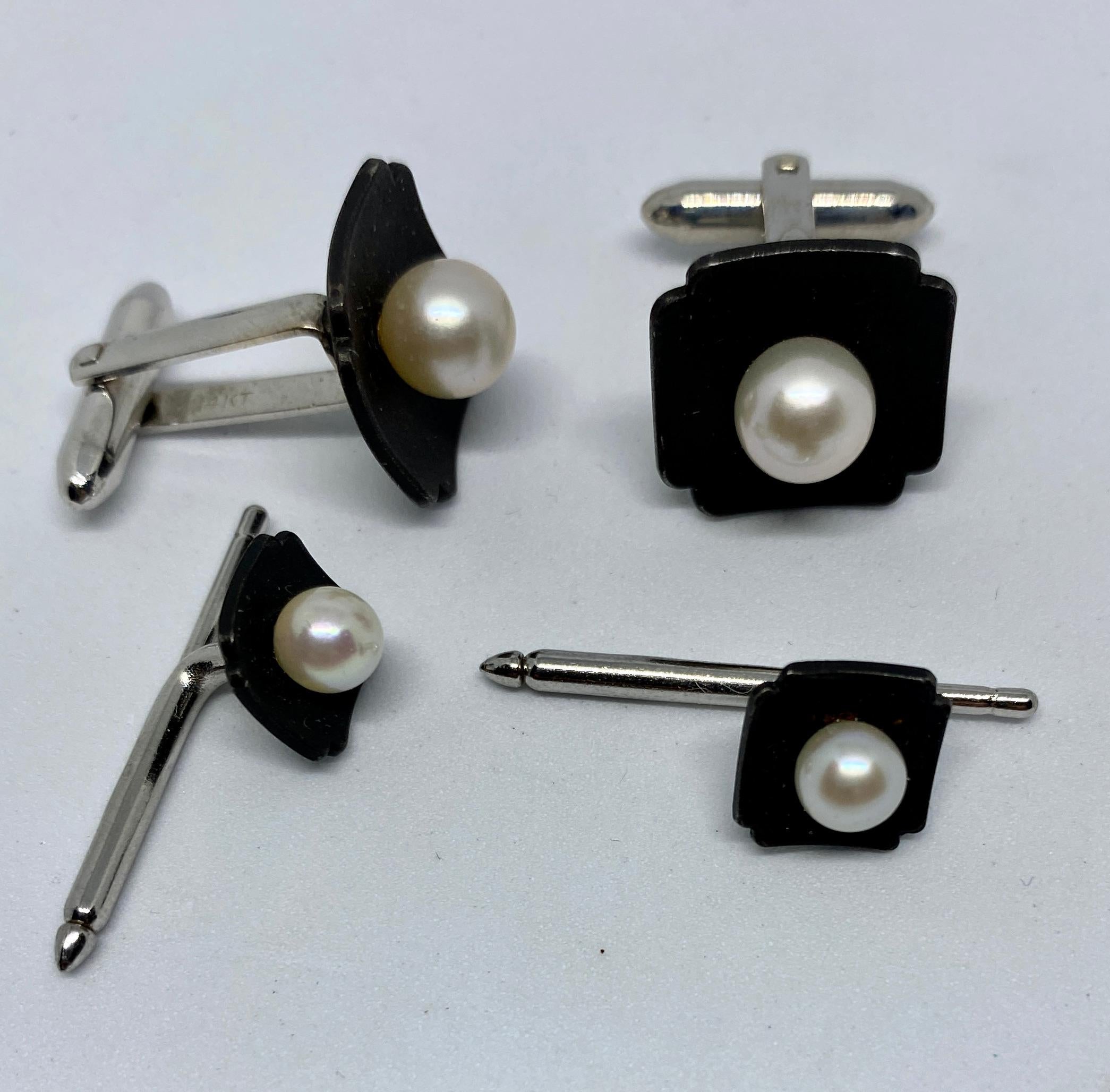 Beautiful, original and highly collectible G.T. Marsh & Company dress set comprised of cufflinks and two matching shirt studs in oxidized steel with round, white cultured pearls and 14K white gold fittings. Note that this set is very similar to