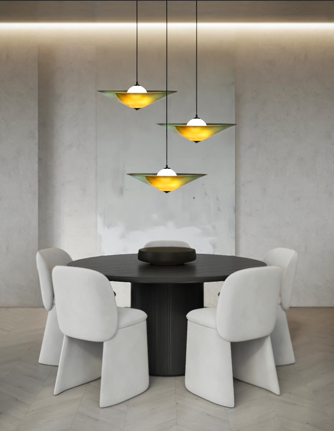 Designed & First Produced 2022 (By Riya Panchal of MESEME Studio)

About MARSHA Collection – Consisting of Pendant Lights and Table Lamps
Influenced by the unwavering determination of the Roman war goddess, our MARSHA Collection embodies
